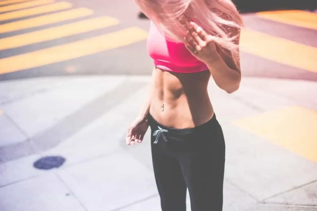 Woman with toned stomach after LA-EMS Body Sculpting Treatment Cottenham Park